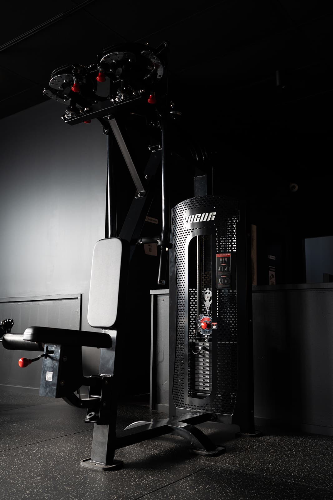Vigor pec deck and reverse flye machine on the gym floor